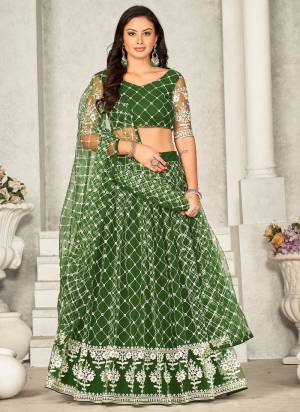 Garb These Partywear Lehenga Choli in Fine Colored.These Lehenga Are Net Choli Are Net And Dupatta Are Fabricated On Net Pair.Its Beautified With Designer Embroidery Work.