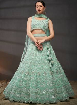 Attrective Looking This Partywear Fine Color Heavy Designer Choli Fabric Shantoon And Lahenga Net And Dupatta Net In Fabricated Beautified With Attrective Designer Thread,Sequance Embroidery Work. Buy Now.