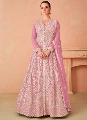 Garb These Party Wear Designer Anarkali Suits in Fine Colored Pair With Dupatta.These Top And Dupatta Are Fabricated On Georgette Pair With Santoon Bottom.Its Beautified With Designer Heavy Embroidery Work.