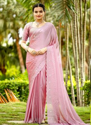 Looking These Party Wear Saree in Fine Colored.These Saree And Blouse is Fabricated On Satin Chiffon.Its Beautified With Heavy Designer Broad Hand Work With Stone Work.