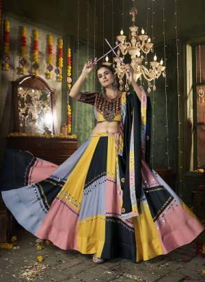 Attrective These Navratri Special Lehenga Choli in Fine Colored.These Lehenga Are Muslin Cotton And Blouse Are Muslin Cotton And Dupatta Are Fabricated On Muslin Cotton.Its Beautified With Designer Printed With Mirror,Thread Embroidery Work.