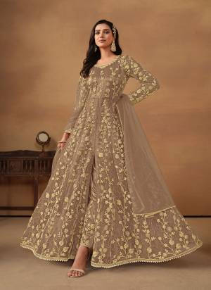 Garb These Party Wear Anarkali Suit in Fine Colored Pair With Bottom And Dupatta.These Top Are Net And Dupatta Are Fabricated On Net Pair With Satin Bottom.Its Beautified With Satin Inner.Its Beautified With Designer Heavy Embroidery Work.