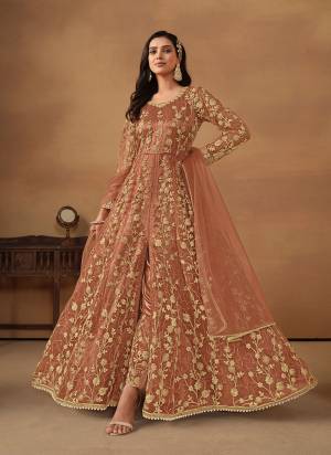 Garb These Party Wear Anarkali Suit in Fine Colored Pair With Bottom And Dupatta.These Top Are Net And Dupatta Are Fabricated On Net Pair With Satin Bottom.Its Beautified With Satin Inner.Its Beautified With Designer Heavy Embroidery Work.