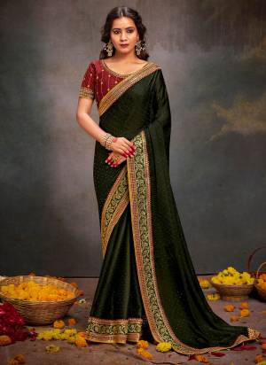 Looking These Party Wear Saree in Fine Colored.These Saree Are B S Y Satin And Blouse is Fabricated On Banglori Silk.Its Beautified With Designer Embroidery Work Blouse And Lace Border With Swarovski Work.