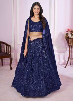 For A Designer Look,Grab These Lehenga Choli in Fine Colored.These Lehenga And Choli Are Fabricated On Georgette Pair With Georgette Dupatta.Its Beautified With Designer Sequance,Thread Embroidery Work.