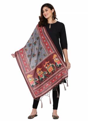 Grab These Beautiful Ethnic Colored Dupatta.This Dupatta is Fabricated On Smart Muslin Cotton Fabric . It Is Beautified With Beautiful Digital Prints And Ethnic Tussels On Pallu Side.