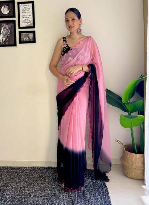 Grab This Beautiful Padding Colour Saree With Fancy Arco Border Work And Heavy Embroidery Sequins Work Blouse Fabricated On Faux Georgette Fabric For Elegant Party Looks. Have This Bollywood Style Saree For Glamorous Feels