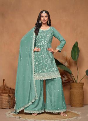 Garb These Party Wear Anarkali Suit in Fine Colored Pair With Bottom And Dupatta. This Suit is fabricated on Chinon Fabric. Its Beautified With Designer Heavy Embroidery And Sequins Work. This Suit Comes with Stitched Palazzo Pant.