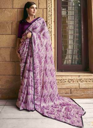 Beautifully Crafted Smart Beads work with Print Saree For The Real Fashion Seekers. This Saree Is Fabricated On Satin Silk Fabric With Festive Purple Color For Glamorous Looks.