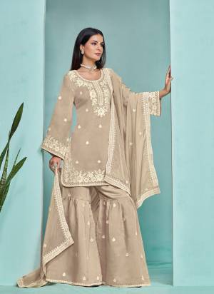 Garb These Party Wear Sharara Suit in Fine Colored Pair With Bottom And Dupatta.These Top And Bottom Are Fabricated On Roman Silk Pair With Organza Dupatta.Its Beautified With Santoon Inner.Its Beautified With Designer Heavy Embroidery Work.