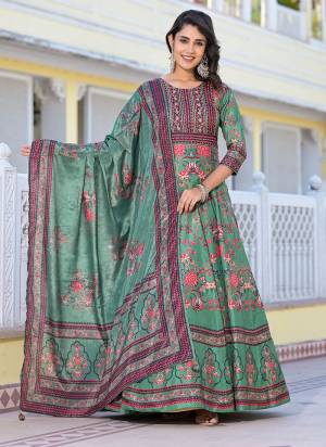 For A Designer Look,Grab These Readymade Gown With Dupatta in Fine Colored.These Gown Are Fabricated On Dola Silk Pair With Chinon Dupatta.Its Beautified With Designer Digital Printed With Hand Work.