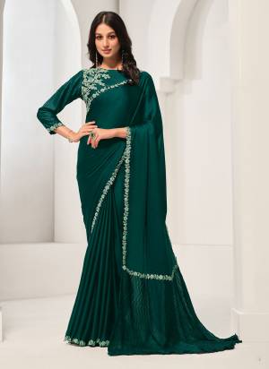 Look Attrective These Designer Party Wear Saree in Fine Colored.These Saree Are Crepe Satin Silk And Blouse Crepe Satin Silk  is Fabricated.Its Beautified Desiger Hand Work.