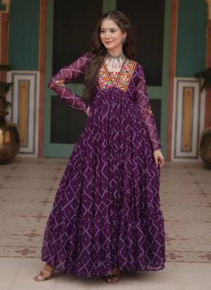 Attrective Looking These Beautiful Looking Readymade Long Gown.These Gown is Fabricated On Faux Georgette.Its Beautified With Designer Bandhani Printed With Kutchi Patch Work.