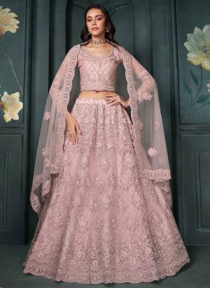 For A Designer Look,Grab These Lehenga Choli in Fine Colored.These Lehenga And Blouse Are Fabricated On Soft Net Pair With Soft Net Dupatta.Its Beautified With Designer Heavy Embroidery With Diamond Work.