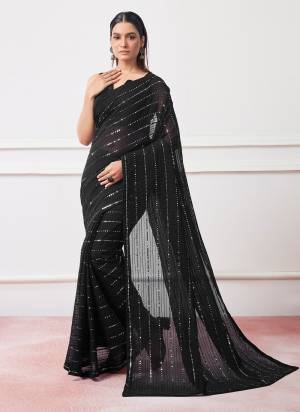 Grab These Party Wear Saree in Fine Colored.These Saree is Fabricated On Georgett Pair With Art Silk Blouse.Its Beautified With Designer Embroidery Work.