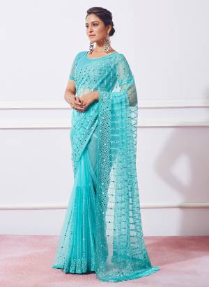 Grab These Party Wear Saree in Fine Colored.These Saree is Fabricated On Net Pair With Art Silk Blouse.Its Beautified With Designer Embroidery Work.