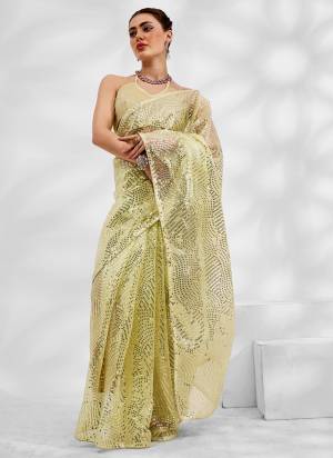 Grab These Party Wear Saree in Fine Colored.These Saree is Fabricated On Net Organza Pair With Art Silk Blouse.Its Beautified With Designer Embroidery Work.