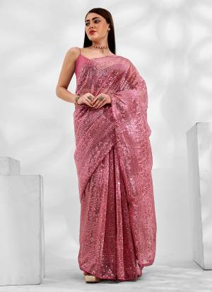 Grab These Party Wear Saree in Fine Colored.These Saree is Fabricated On Net Organza Pair With Art Silk Blouse.Its Beautified With Designer Embroidery Work.