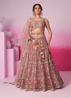 Attrective Looking This Partywear Fine Color Fancy Heavy Designer Choli And Lahenga Fabriced On Net And Dupatta Net In Fabricated Beautified With Attrective Designer Heavy EmbroideryWork. Buy Now.