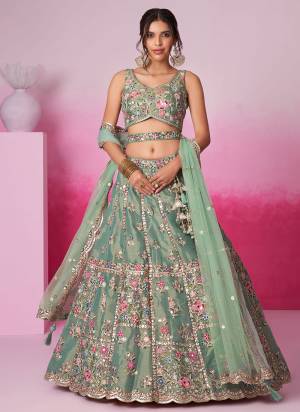 Attrective Looking This Partywear Fine Color Fancy Heavy Designer Choli And Lahenga Fabriced On Net And Dupatta Net In Fabricated Beautified With Attrective Designer Heavy EmbroideryWork. Buy Now.