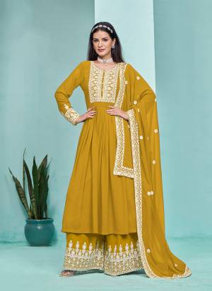 Garb These Party Wear Plazzo Suit in Fine Colored Pair With Bottom And Dupatta.These Top And Bottom Are Fabricated On Faux Georgette Pair With Faux Georgette Dupatta.Its Beautified With Santoon Inner.Its Beautified With Designer Heavy Embroidery Work.