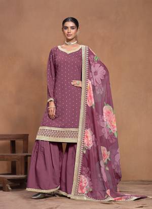 Garb These Party Wear Plazzo Suit in Fine Colored Pair With Bottom And Dupatta.These Top And Bottom Are Fabricated On Roman Silk Pair With Organza Dupatta.Its Beautified With Santoon Inner.Its Beautified With Designer Embroidery Work With Printed Dupatta.