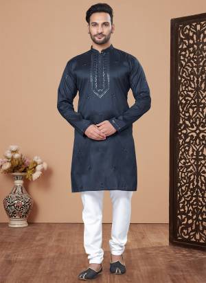 Looking These Party Wear Mans Wear Kutra Payjama wearing this fashionable. Tailored Kurta Are Silk And Payjama Raymond Cotton finest Silk Fabriced With Designer Embroidery Work and fashioned with a banded collar for a dash of style.