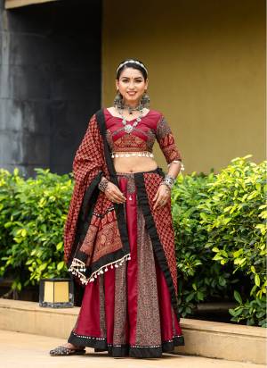 For A Designer Look,Grab These Navratri Lehenga Choli in Fine Colored.These Lehenga And Blouse Are Fabricated On Cotton Pair With Cotton Dupatta.Its Beautified With Designer Printed With Work.