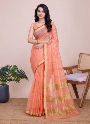 Garb This Partywear Saree Paired With Blouse.This Saree And Blouse Are Kota Doriya Based Fabric With Weaving Jari Designer. Buy This Pretty Saree Now.