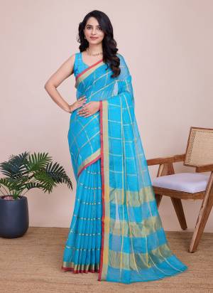 Garb This Partywear Saree Paired With Blouse.This Saree And Blouse Are Kota Doriya Based Fabric With Weaving Jari Designer. Buy This Pretty Saree Now.