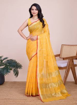 Garb This Partywear Saree Paired With Blouse.This Saree And Blouse Are Kota Doriya Based Fabric With Weaving Jari Designer. Buy This Pretty Saree Now.