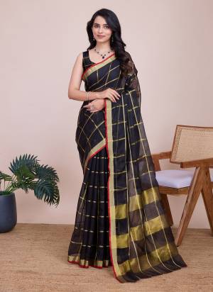 Garb This Partywear Saree Paired With Blouse.This Saree And Blouse Are Kota Doriya Based Fabric With Weaving Jari Designer. Buy This Pretty Saree Now.