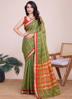 Attrective This Partywear Saree Paired With Blouse.This Saree And Blouse Are Kota Doriya Based Fabric With Weaving Jari Designer. Buy This Pretty Saree Now.