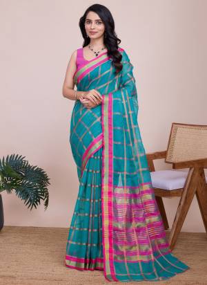 Attrective This Partywear Saree Paired With Blouse.This Saree And Blouse Are Kota Doriya Based Fabric With Weaving Jari Designer. Buy This Pretty Saree Now.