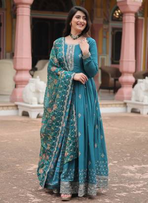 Garb These Beautiful Looking Party Wear Readymade Long Gown With Dupatta.These Gown is Fabricated On Chinon And Taby Silk Dupatta.Its Beautified With Designer Sequance Embroidery Work With Kalamkari Printed Dupatta.