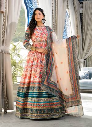 For A Designer Look,Grab These Readymade Gown With Dupatta in Fine Colored.These Gown Are Fabricated On Dola Silk Pair With Chinon Dupatta.Its Beautified With Designer Digital Printed With Neck Line Hand Work.