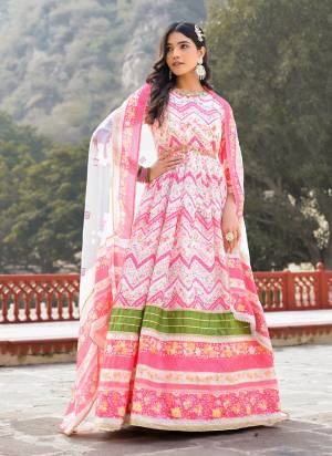 For A Designer Look,Grab These Readymade Gown With Dupatta in Fine Colored.These Gown Are Fabricated On Dola Silk Pair With Chinon Dupatta.Its Beautified With Designer Digital Printed With Neck Line Hand Work.