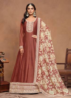 Garb These Party Wear Anarkali Suit in Fine Colored Pair With Dupatta.These Top Are Art Silk And Dupatta Are Fabricated On Organza Pair.Its Beautified With Santoon Inner.Its Beautified With Designer Embroidery Work With Printed Dupatta.