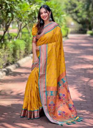 Attrective These Party Wear Saree in Fine Colored.These Saree And Blouse is Fabricated On Paithani Silk.Its Beautified With Weaving Jacquard Meenakari Designer.