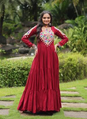 Garb These Beautiful Looking  Readymade Long Gown.These Gown is Fabricated On Rayon.Its Beautified With Designer Kutchi Gamthi Patch Work.