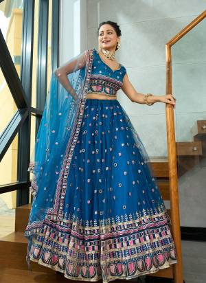 Attrective These Party Wear Lehenga Choli in Fine Colored.These Lehenga Are Net Choli Are Net And Dupatta Are Fabricated On Net Pair.Its Beautified With Designer Sequance Embroidery Work.