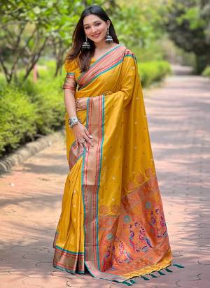 Attrective These Party Wear Saree in Fine Colored.These Saree And Blouse is Fabricated On Paithani Silk.Its Beautified With Weaving Jacquard Meenakari Designer.