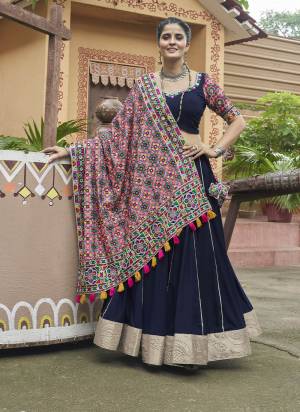 Attrective These Navratri Special Lehenga Choli in Fine Colored.These Lehenga Are Viscose Rayon And Blouse Are Viscose Rayon And Dupatta Are Fabricated On Viscose Rayon.Its Beautified With Designer Mirror,Thread Embroidery Work.