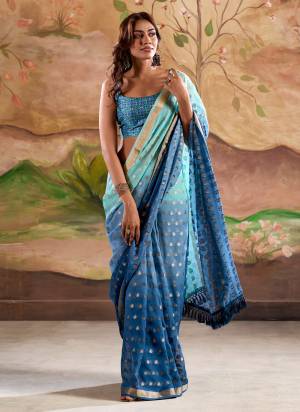 Looking These Party Wear Saree in Fine Colored.These Saree Are Georgette And Blouse is Fabricated On Handloom.Its Beautified With Weaving Jari Butti Designer With Printed Blouse.