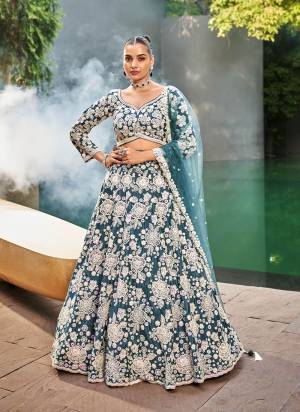 Attrective Looking This Partywear Fine Color Fancy Heavy Designer Choli And Lahenga Fabriced On Satin And Dupatta Net In Fabricated Beautified With Attrective Designer Heavy Embroidery Work. Buy Now.