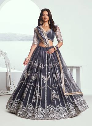 For A Different Look,Grab These Party Wear Designer Lehenga in All Over Pretty Colored Pair With Blouse And Dupatta.These Lehenga Choli And Dupatta is All Over Butterfly Net Base Fabric With Designer Cotton Thread,Sequance Embroidery Work.