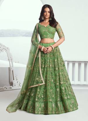 For A Different Look,Grab These Party Wear Designer Lehenga in All Over Pretty Colored Pair With Blouse And Dupatta.These Lehenga Choli And Dupatta is All Over Butterfly Net Base Fabric With Designer Cotton Thread,Sequance Embroidery Work.