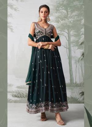 Grab These Party Wear Suit in Fine Colored Pair With Bottom.These Top Are Fabricated On Rangoli Georgette Pair With American Bottom And Soft Net Dupatta.Its Beautified With Heavy Designer Jari,Thread,Sequance Embroidery Work.