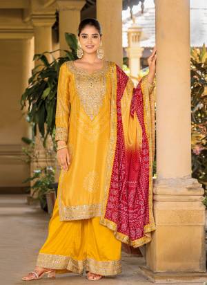 Attrective These Party Wear Plazzo Suit in Fine Colored Pair With Bottom And Dupatta.These Top Are Chinon And Dupatta Are Fabricated On Chinon Pair With Chinon Bottom.Its Beautified With Bandhani Printed With Designer Jari,Mirror Embroidery Work.