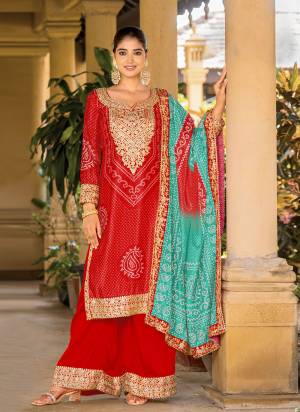 Attrective These Party Wear Plazzo Suit in Fine Colored Pair With Bottom And Dupatta.These Top Are Chinon And Dupatta Are Fabricated On Chinon Pair With Chinon Bottom.Its Beautified With Bandhani Printed With Designer Jari,Mirror Embroidery Work.